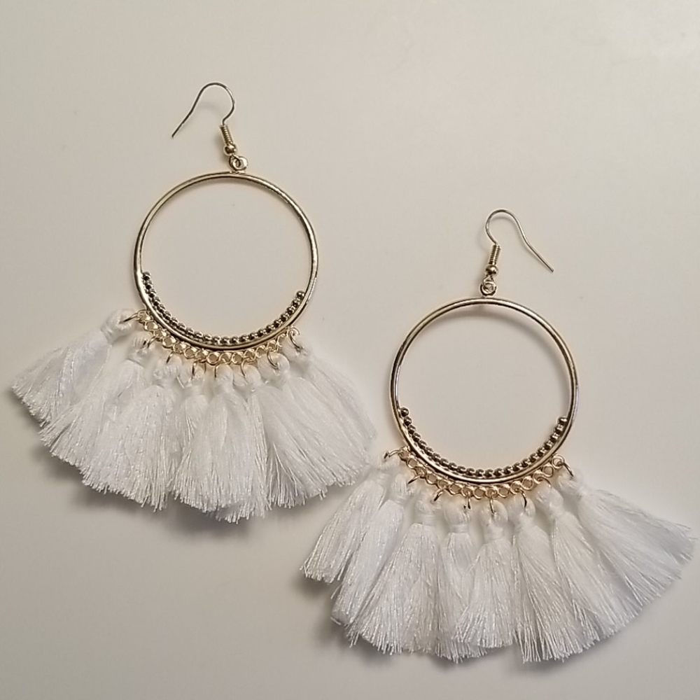 Gold hoop with textured white fringe dangles